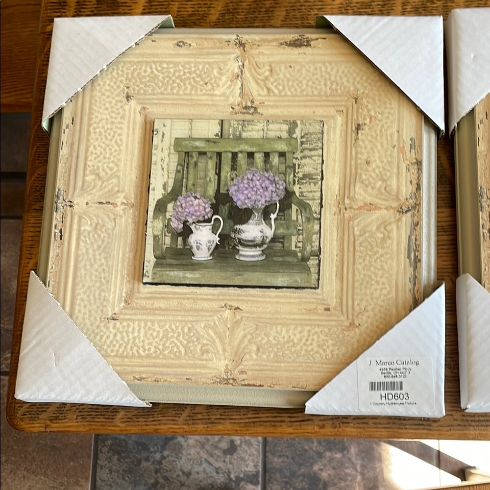 NIB set of two floral wall hangings. Each measures 11x11